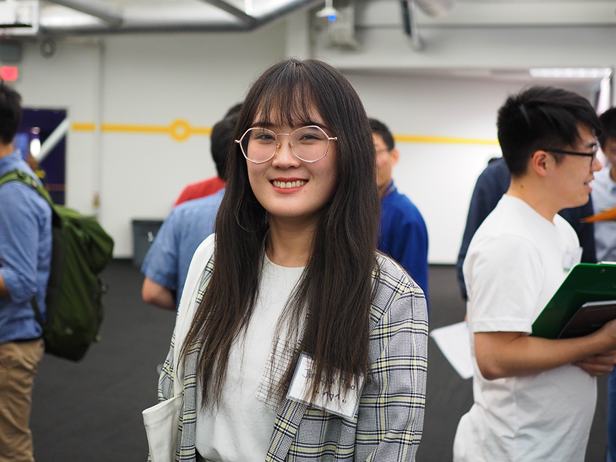 Female student smiling at 2019 event