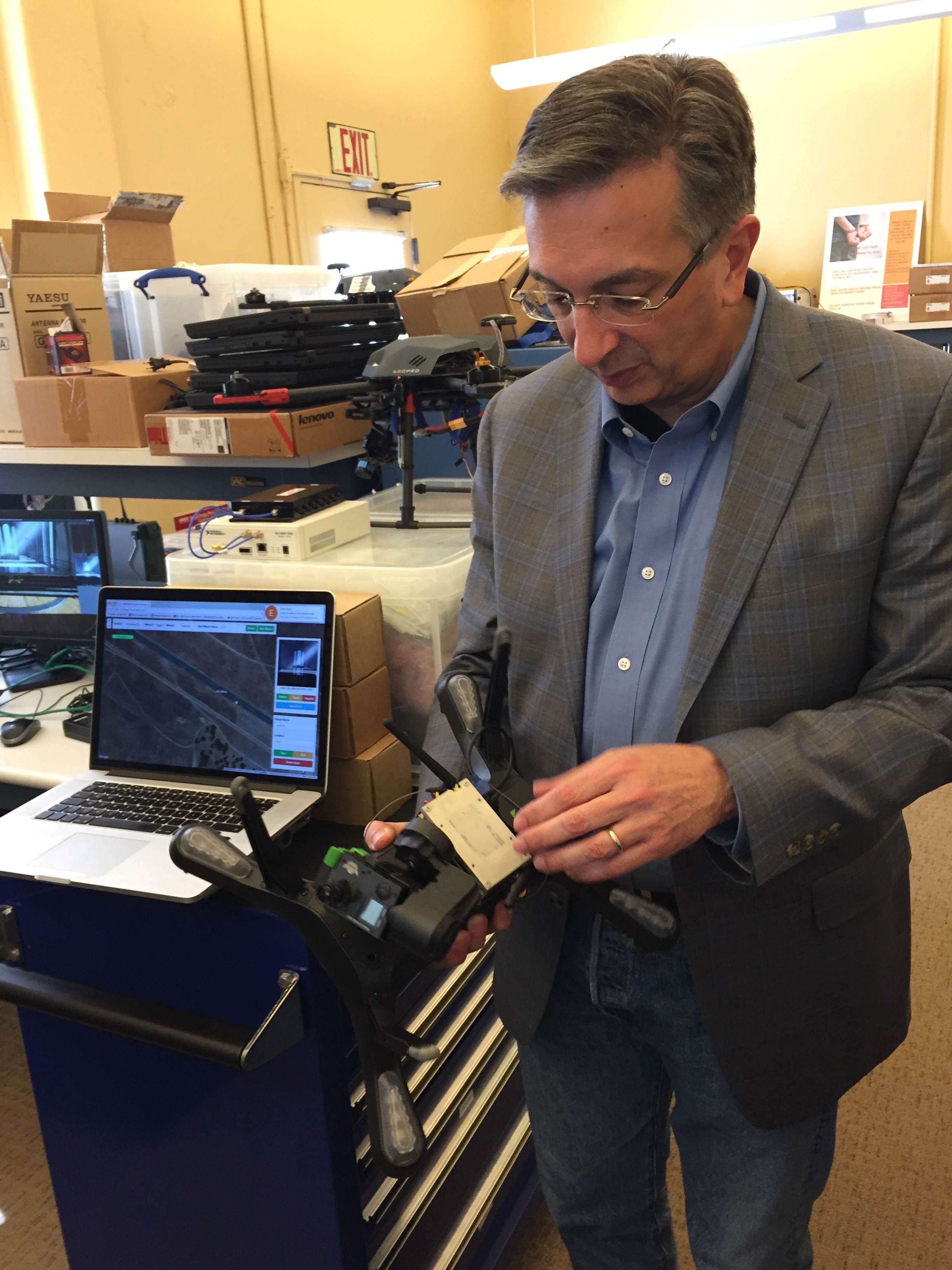Iannucci holds a drone used in the VIPER project
