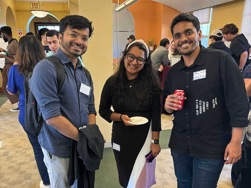 Students and alumni gather at mixer